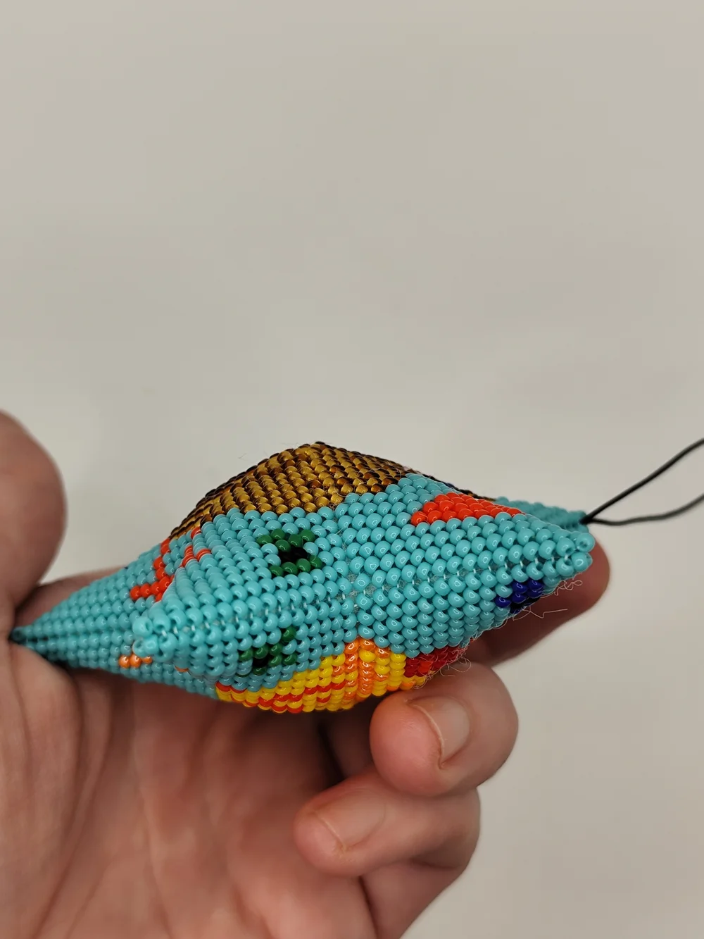 Handcrafted Turquoise Star Bird Ornament with Gold Chicken Design